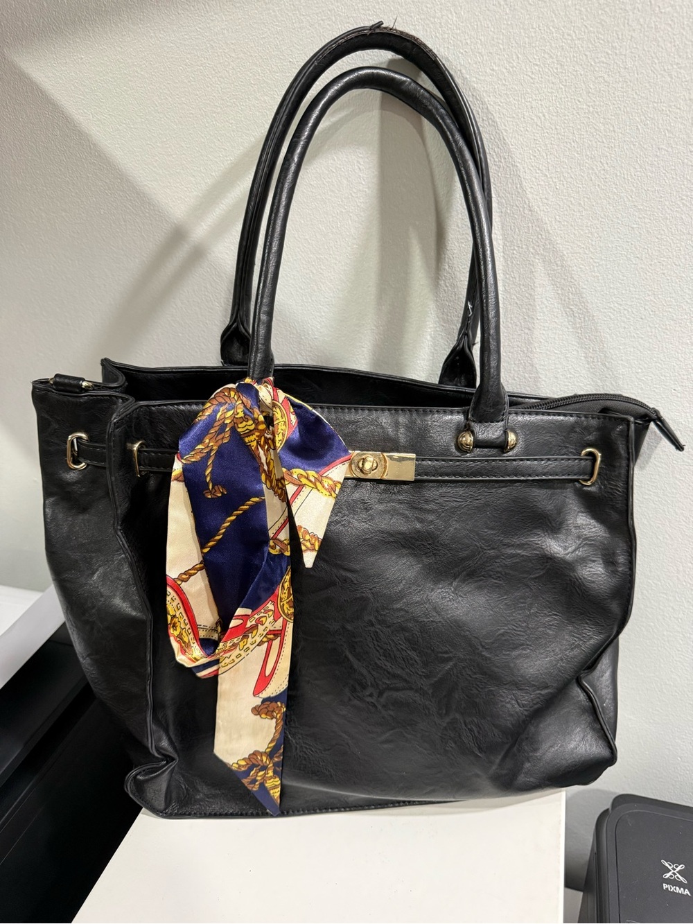 Classic Black Leather Tote Bag with Decorative Scarf